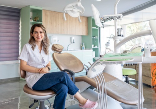 A dentist is seen in her office. Associates In Dentistry is a dental office.