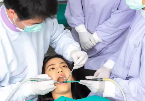 A patient is seen receiving dental care. Associates In Dentistry offers Dental Care.