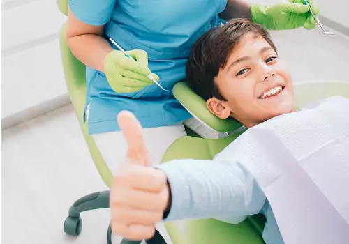 A boy is seen at the dentist. Associates In Dentistry is a Family Dentist.