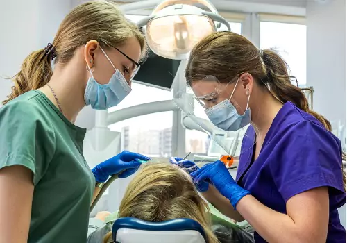 A patient is seen at the dentist. Associates In Dentistry is a Local Dentist in Washington IL.