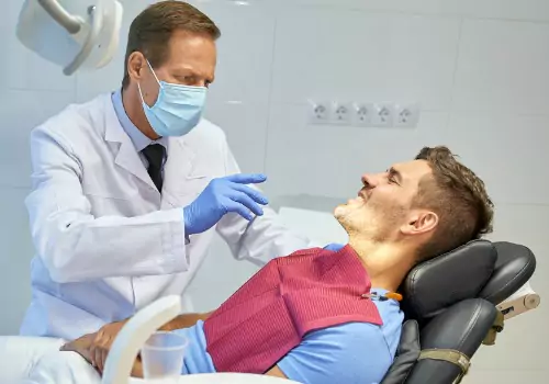 A patient is seen receiving services. Associates In Dentistry is a Local Dentist in East Peoria IL.