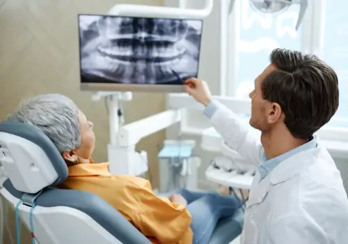 A Dentist Near You discussing an oral x-ray to a patient