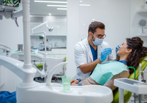 A patient is seen receiving dental care. Associates In Dentistry offers dental care in central Illinois.