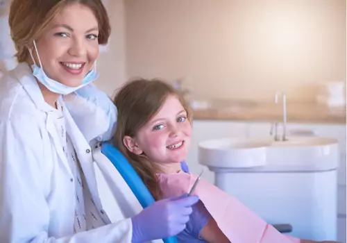 A child is seen at a dental visit. Associates In Dentistry is a pediatric dentist in Peoria IL.