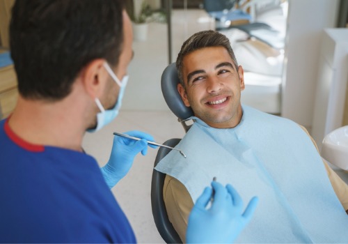 A patient is seen receiving dental care. Associates In Dentistry offers dental care in central Illinois.